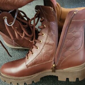 Mens Coach leather boots.